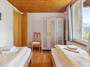 Postel nebo postele na pokoji v ubytování Apartment Bristol Apt-18 by Interhome