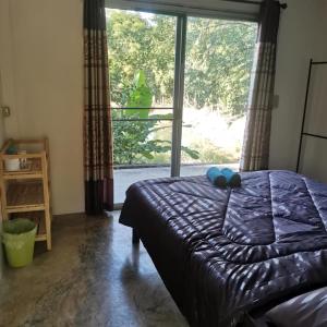 Postel nebo postele na pokoji v ubytování Oasis Pai Resort
