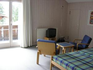 TV a/nebo společenská místnost v ubytování Apartment Arlette Nr- 30 by Interhome