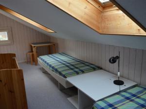 Postel nebo postele na pokoji v ubytování Apartment Arlette Nr- 30 by Interhome