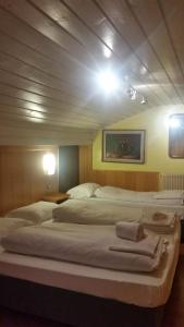 Posteľ alebo postele v izbe v ubytovaní Chalet Belvedere