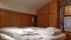 Posteľ alebo postele v izbe v ubytovaní Chalet Belvedere