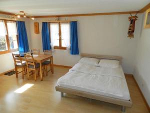 Voodi või voodid majutusasutuse Apartment Studio Rinderbergblick by Interhome toas