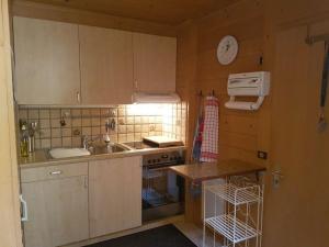 Kuchyň nebo kuchyňský kout v ubytování Apartment Steimandli by Interhome