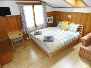 Postel nebo postele na pokoji v ubytování Apartment Studio Oehrli by Interhome