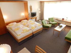 Postel nebo postele na pokoji v ubytování Apartment La Sarine 222 by Interhome
