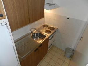 Kuchyň nebo kuchyňský kout v ubytování Apartment La Sarine 222 by Interhome