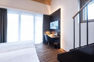 Hotel Krone - Aktiv & Erholt房間的床