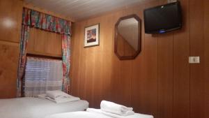 Posteľ alebo postele v izbe v ubytovaní Chalet Belvedere