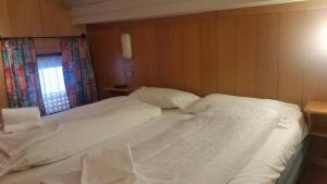 Posteľ alebo postele v izbe v ubytovaní Chalet Belvedere