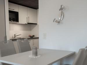 Kuchyň nebo kuchyňský kout v ubytování Apartment Zurschmitten 12 1- UG Süd by Interhome