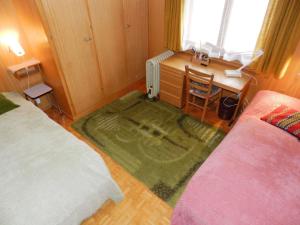 Postel nebo postele na pokoji v ubytování Apartment Fluehüsli by Interhome