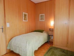 Postel nebo postele na pokoji v ubytování Apartment Fluehüsli by Interhome