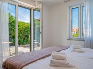 Postel nebo postele na pokoji v ubytování Villa Vali 1 by Interhome