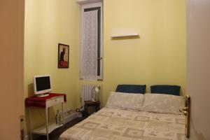 Postel nebo postele na pokoji v ubytování Bovisa il Design avanza
