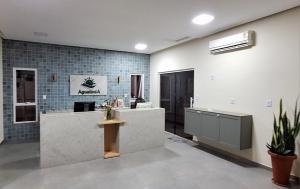 a lobby with a reception desk in a building at Agualinda Hotel in Alter do Chao +55 photos