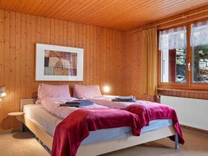 En eller flere senger på et rom på Apartment Heimine by Interhome