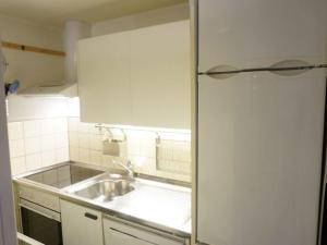 Kuchyň nebo kuchyňský kout v ubytování Apartment La Sarine 13 by Interhome