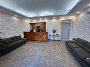 Posezení v ubytování EH Suites Rome Airport Euro House Hotels
