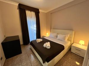 Postel nebo postele na pokoji v ubytování EH Suites Rome Airport Euro House Hotels