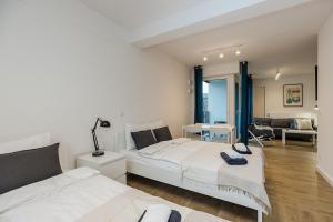 Ένα ή περισσότερα κρεβάτια σε δωμάτιο στο Lineburg Villa Apartments