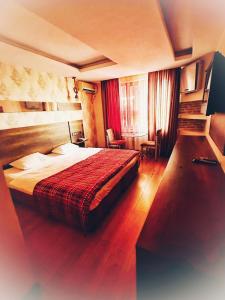 Postel nebo postele na pokoji v ubytování Hotel Altunhan + 37 fotografií