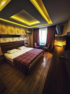 Postel nebo postele na pokoji v ubytování Hotel Altunhan