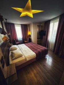 Postel nebo postele na pokoji v ubytování Hotel Altunhan