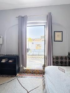 Katil atau katil-katil dalam bilik di Riad ider