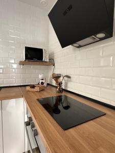 Kuchyňa alebo kuchynka v ubytovaní Apartamento Entre dos mares + 19 fotografií