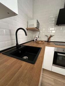 Kuchyňa alebo kuchynka v ubytovaní Apartamento Entre dos mares