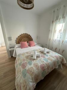 Posteľ alebo postele v izbe v ubytovaní Apartamento Entre dos mares