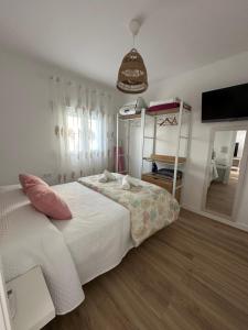 Posteľ alebo postele v izbe v ubytovaní Apartamento Entre dos mares