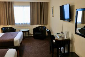 TV a/nebo společenská místnost v ubytování Britannia Hotel Aberdeen