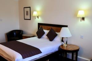 Postel nebo postele na pokoji v ubytování Britannia Hotel Aberdeen