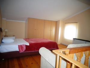 Ένα ή περισσότερα κρεβάτια σε δωμάτιο στο Ξενοδοχείο Bell Air
