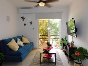 Ruang duduk di Gigi's Caribbean Paradise Aparment