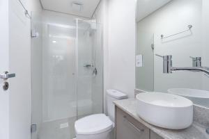 Un baño de Aconchego Perfeito na Serra by Achei Gramado 15 fotos más