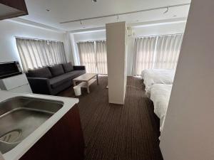 Posezení v ubytování 山中ビル3Fーワンフロア貸切48平方メートルone floor private room