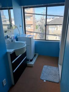 Fotografie z fotogalerie ubytování 山中ビル3Fーワンフロア貸切48平方メートルone floor private room v destinaci Warabi