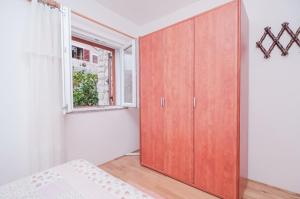 Postel nebo postele na pokoji v ubytování Apartment Luce