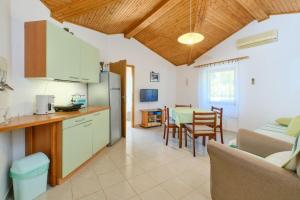 Kuchyň nebo kuchyňský kout v ubytování Apartment Luce