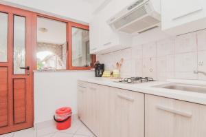 Kuchyň nebo kuchyňský kout v ubytování Apartment Luce