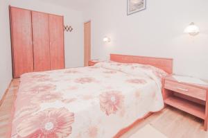Postel nebo postele na pokoji v ubytování Apartment Luce