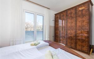 Postel nebo postele na pokoji v ubytování Apartment Nedo