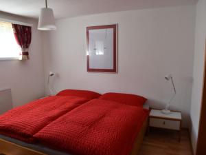 Postel nebo postele na pokoji v ubytování Apartment Am Sonnenhang by Interhome