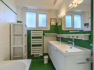 Kúpeľňa v ubytovaní Apartment La Voilerie - Hartimon by Interhome