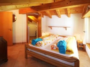 Ein Bett oder Betten in einem Zimmer der Unterkunft Apartment Dominic B by Interhome