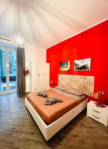 En eller flere senge i et værelse på B&B Cosmoneapolitan