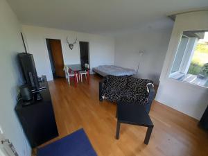 Posezení v ubytování Apartment Chilis Ferienresidenz by Interhome